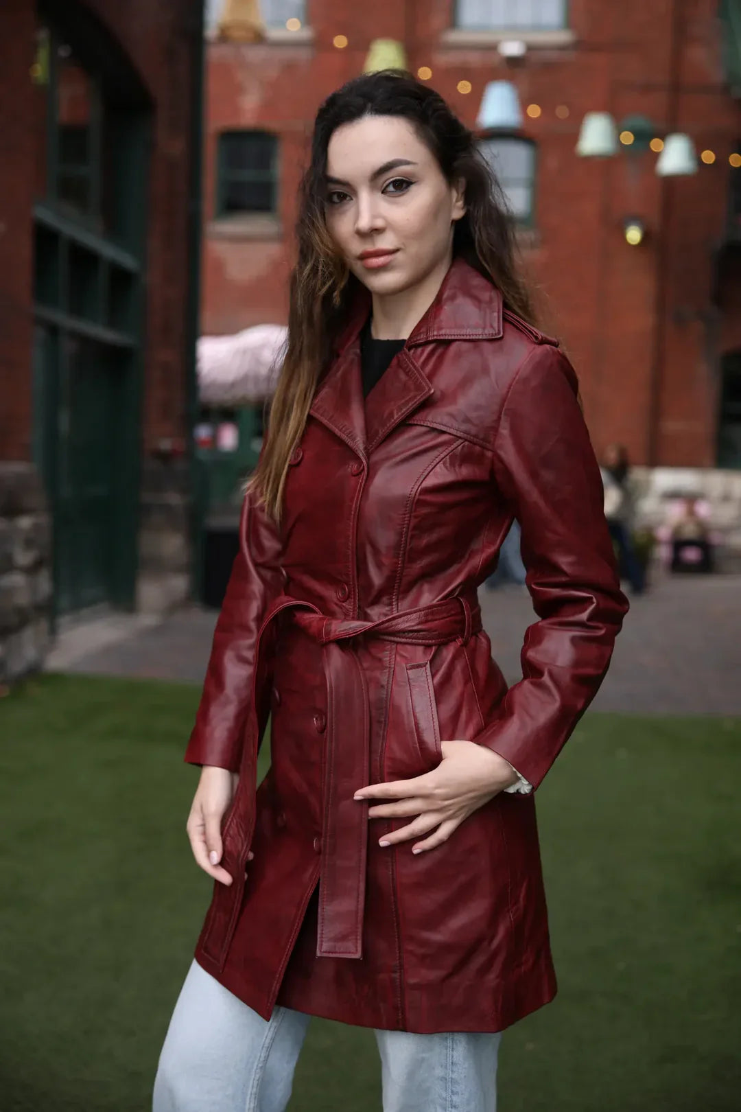 Coral red belted leather coat