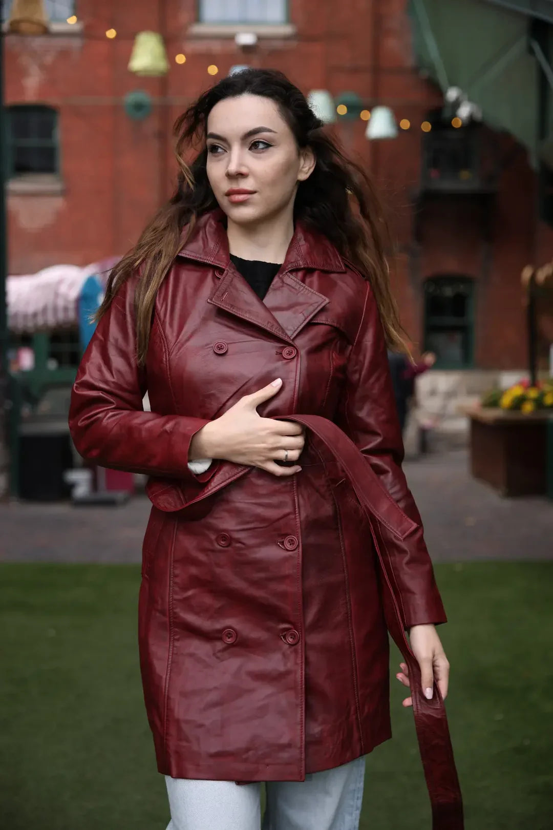 Coral red belted leather coat