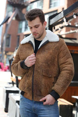 Lucian's distressed brown A2 Bomber shearling jacket